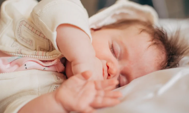 Newborn grunting and squirming while sleeping