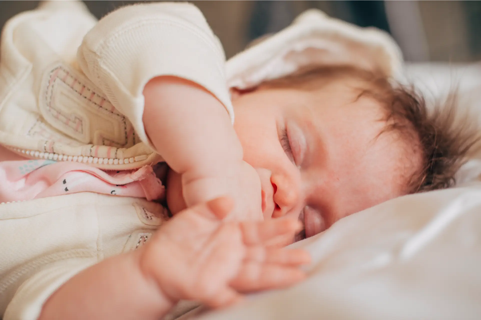 Newborn grunting and squirming while sleeping